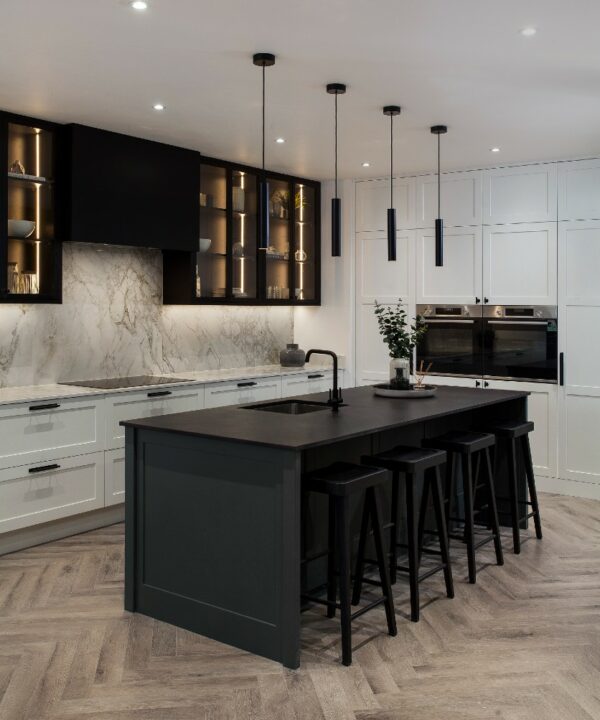 Baton kitchen lights hanging above a kitchen island unit