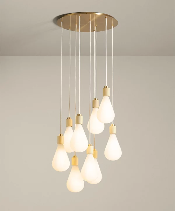 extra large nine light cascading multi pendant with opaque teardrop bulbs, gold hardware and linen fabric cables
